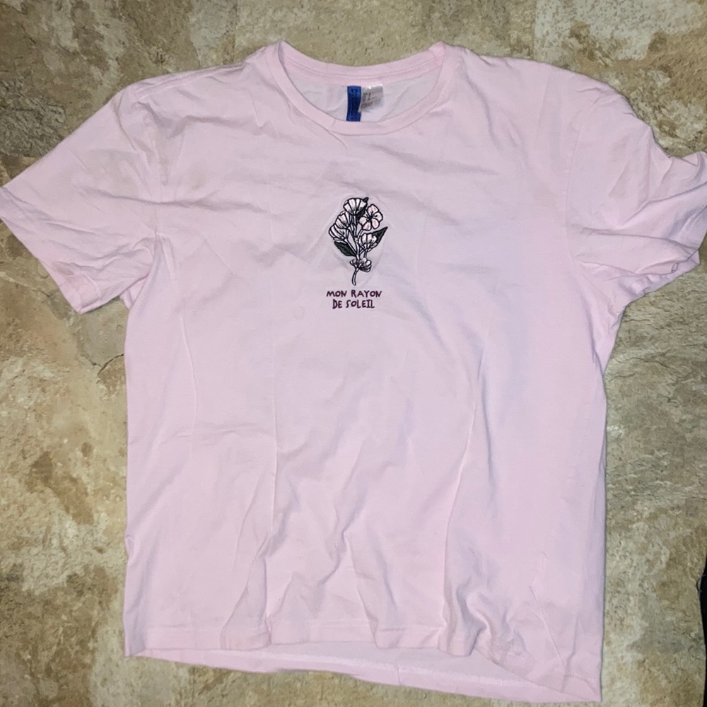 Pink shirt with flower design on front and back